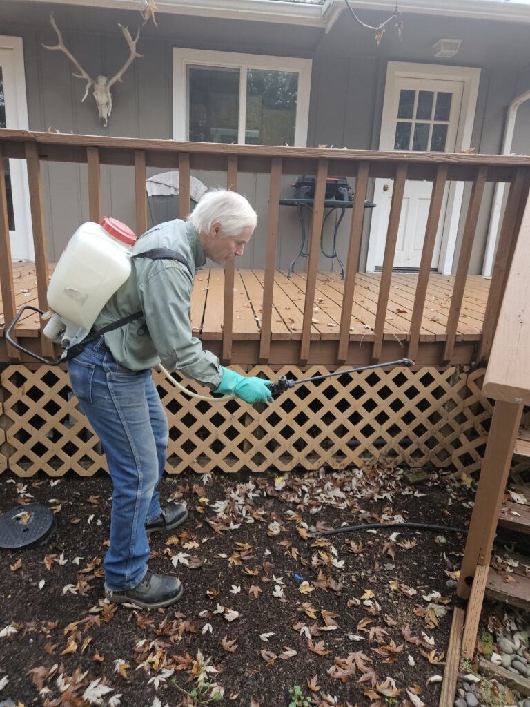 Owner Spraying House | Valley Inspections & Pests | Grants Pass